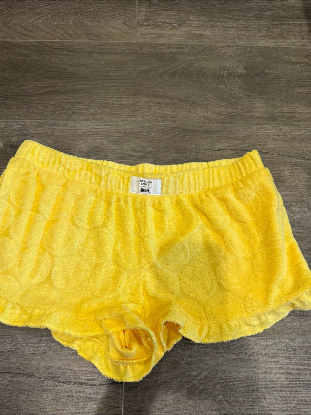 American eagle lounge shorts, smiley faces, ruffle hem, size med, excellent